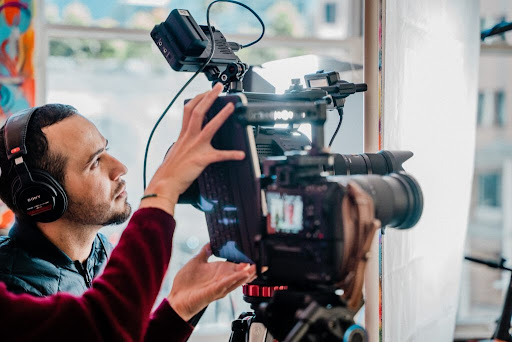 Taking video for social media.